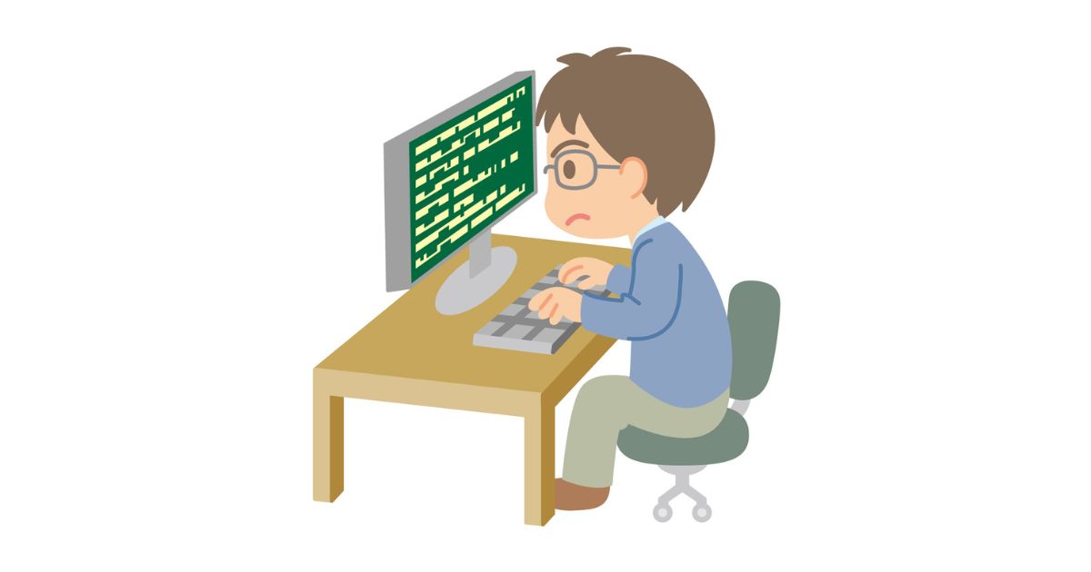 コンピュータに向かって作業する男性