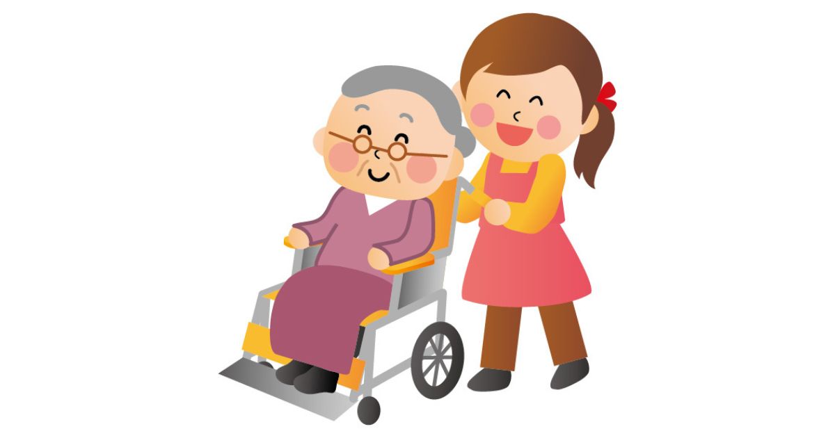 車椅子の高齢者の移動を助ける女性